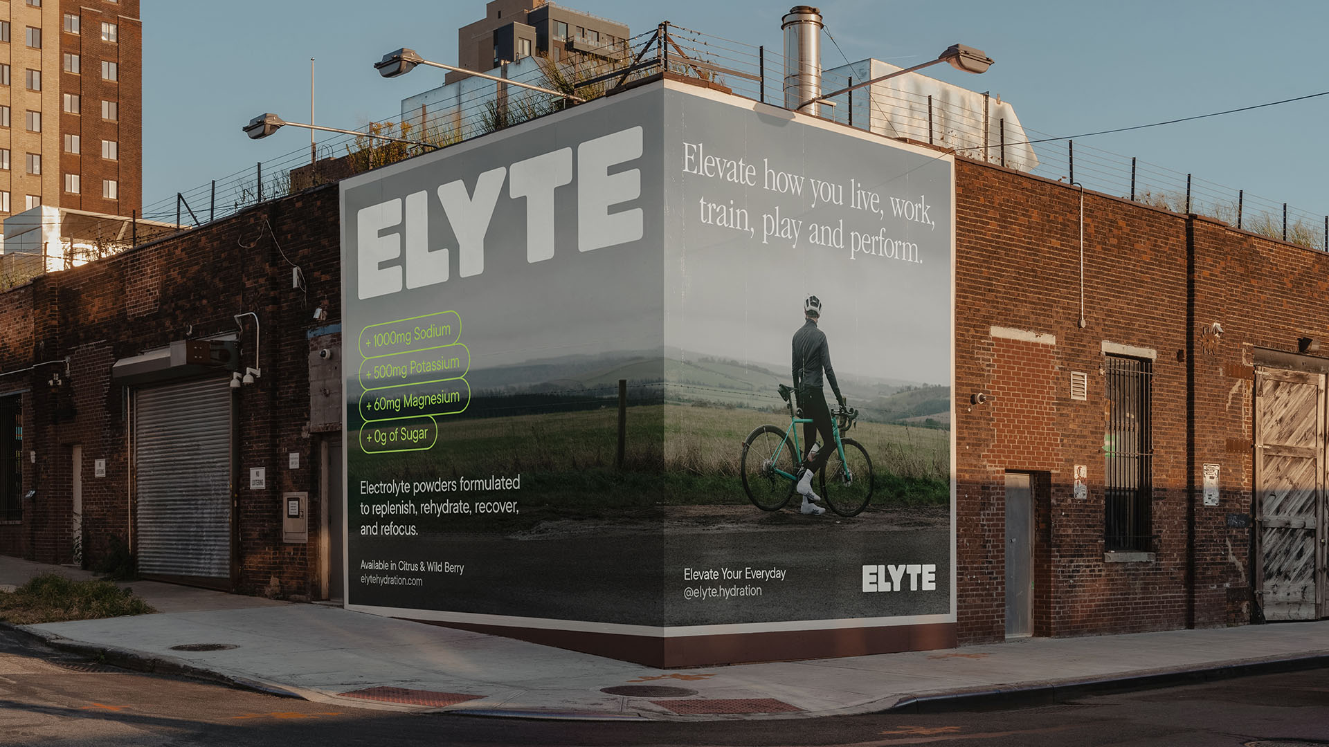 Branded Elyte billboard with a man on a bike and messaging about hydration and Elyte benefits.